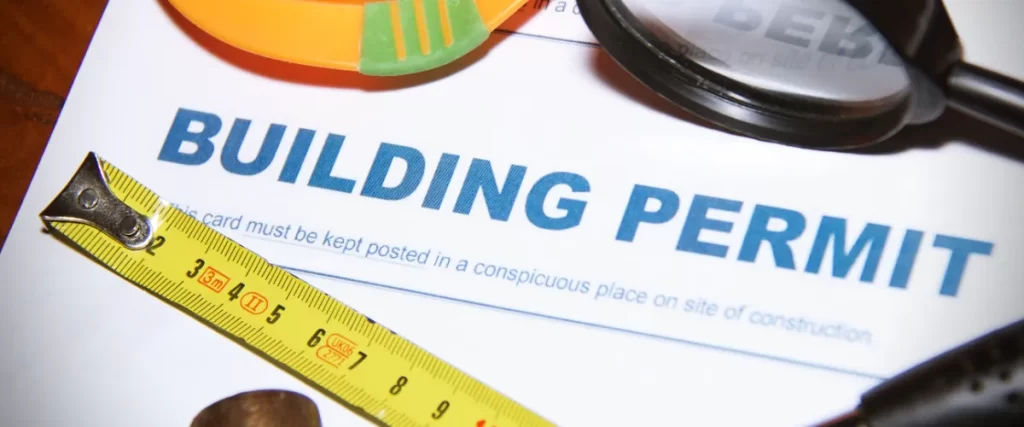 a building permit card, an official document authorizing construction work