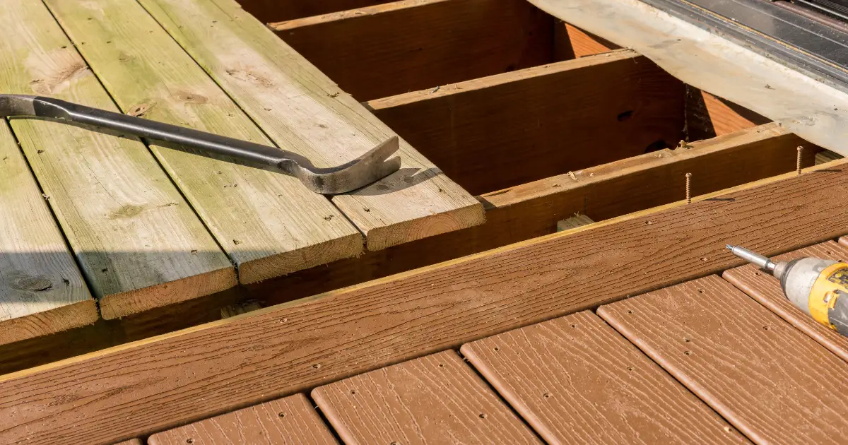 replacement of old wood decking boards with new composite materials